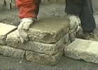 Properly laying retaining wall blocks for stability and natural look