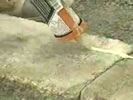 Spreading concrete adhesive