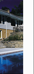 VERSA-LOK Weathered Standard retaining walls used for poolside landscaping