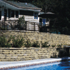 VERSA-LOK Weathered Standard retaining walls used for poolside landscaping